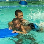 How to Teach a Child to Kick While Swimming